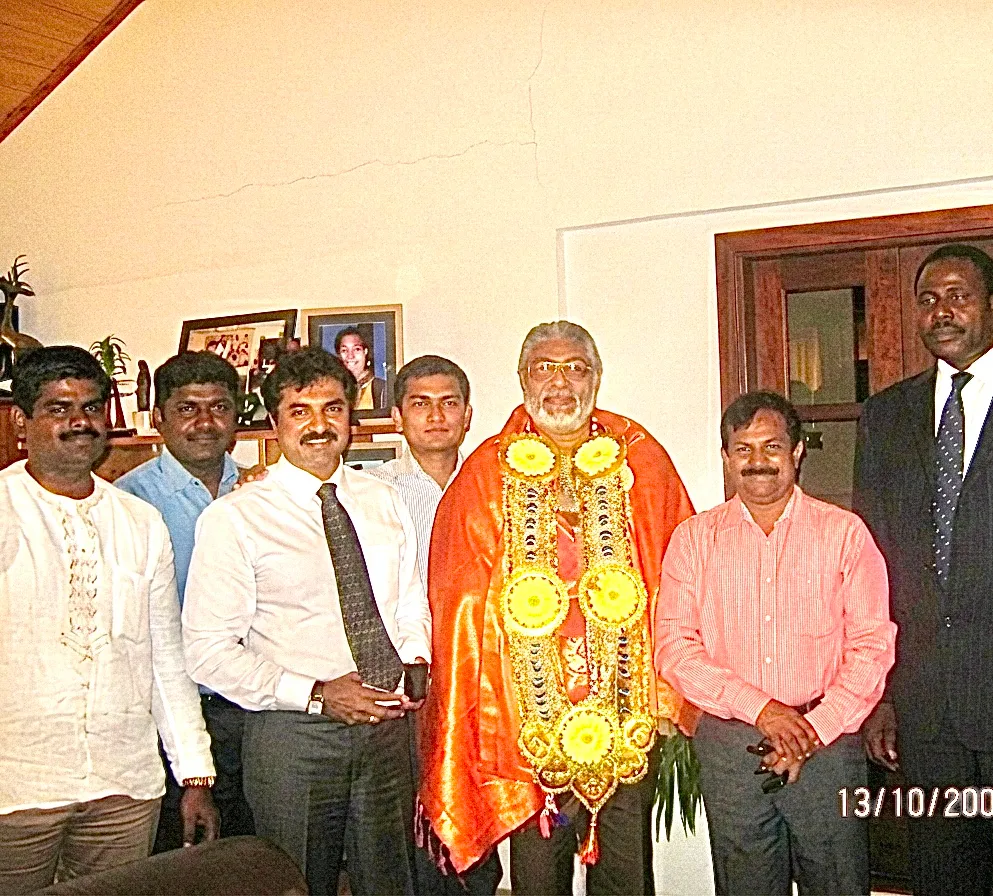 Former President Jerry John Rawlings meeting James Kwame Rajamani, James Rajamani, James Gnanaraj Rajamani, and Immanuel Rajamani of Kingdom Exim